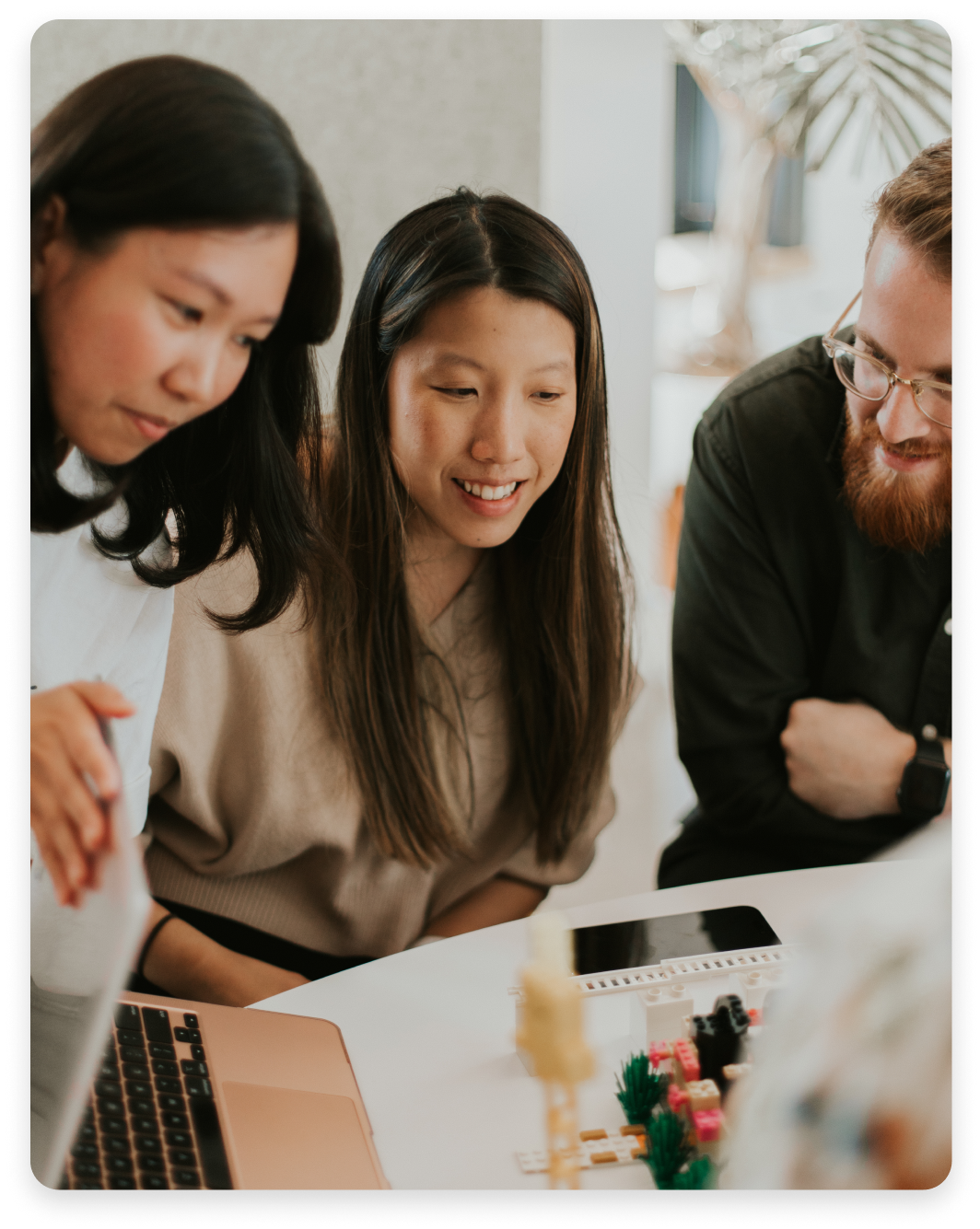 Plank team members collaborating on a project at PAW con